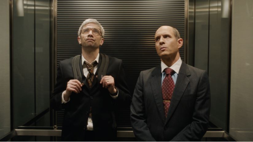 ay Baruchel as “Mike Lazaridis” and Glenn Howerton as “Jim Balsillie” in Matt Johnson’s BlackBerry. (Courtesy of IFC Films. An IFC Films Release.)