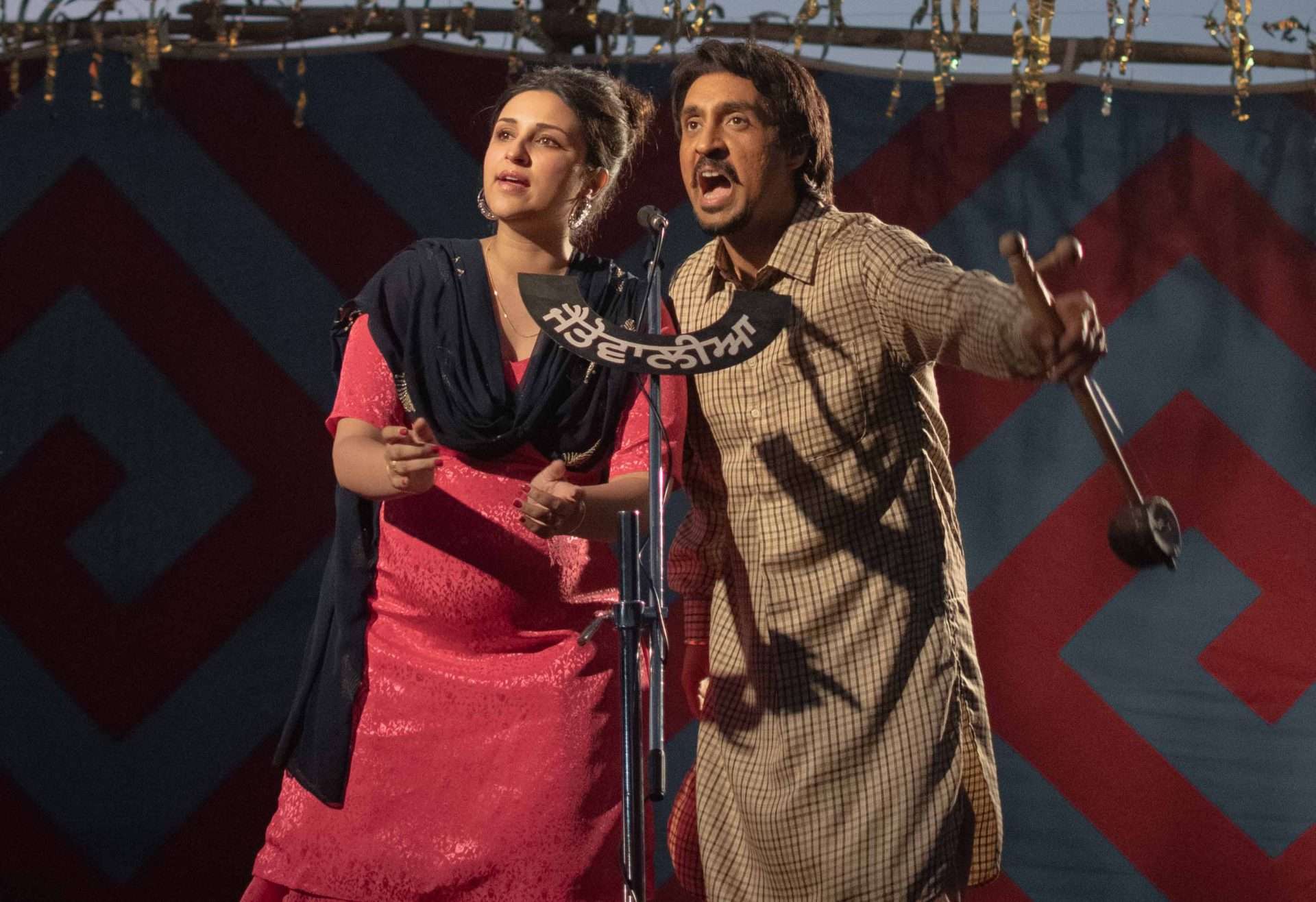 A still from Amar Singh Chamkila (2024). 