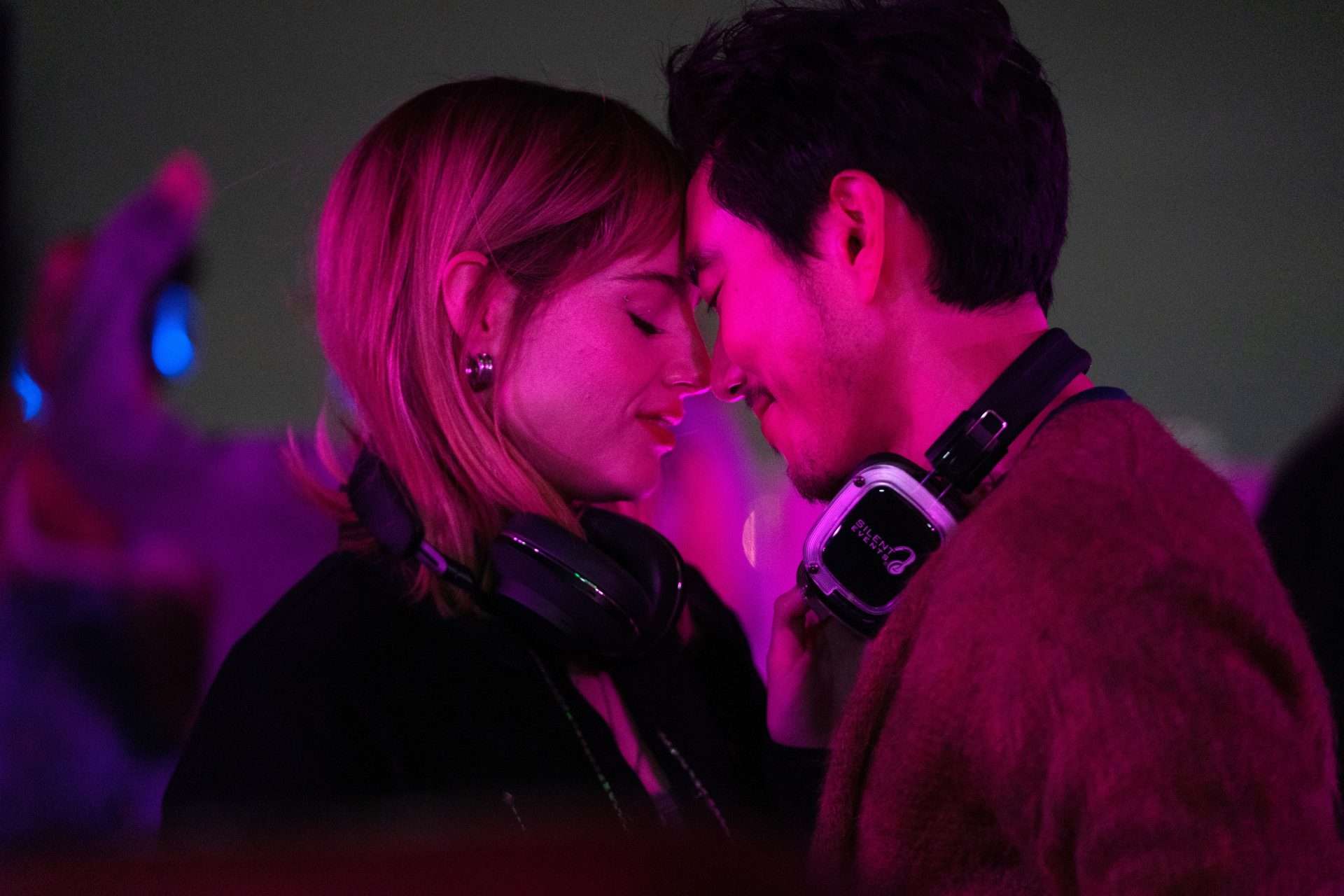 Lucy Boynton as Harriet Gibbons & Justin H. Min as David Park in The Greatest Hits (2024). 