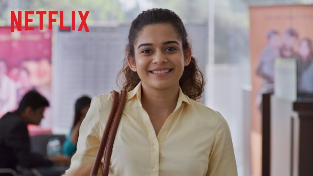 Mithila Palkar smiling in a creame shirt for Chopsticks film, distributed by Netflix