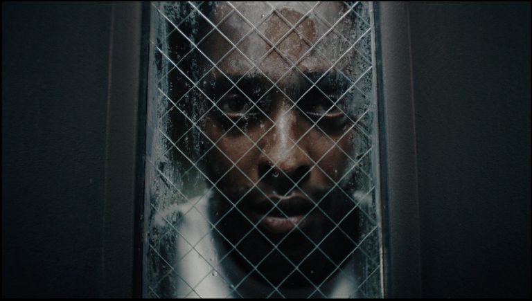 Caged [2021] Review – An uninspiring look at the psychological impact of solitary confinement