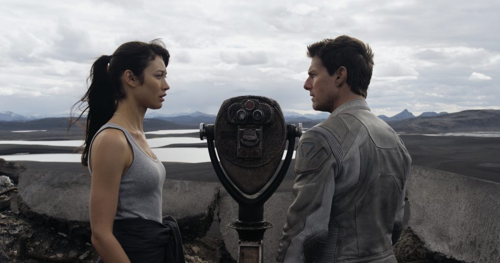 The enigmatic Julia (Olga Kurylenko) surfaces from the mysterious past of Victoria's husband, Jack (Tom Cruise) Oblivion 2013 Explained