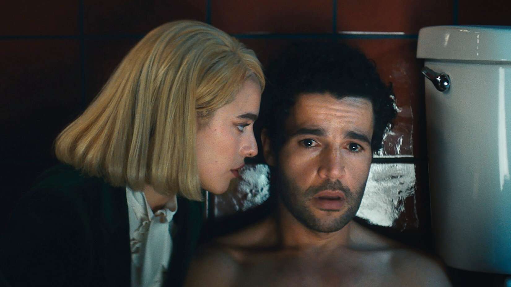 Margaret Qualley and Christopher Abbott in Sanctuary (2023)