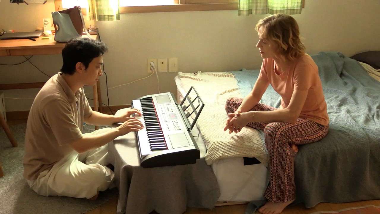 A still from A Traveler's Needs (2024).