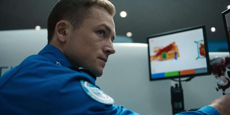 Carry-On (2024) Movie Ending Explained:  How Does Ethan Outsmart the Traveller?